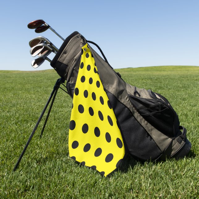 Helles gelbes Golfhandtuch mit schwarzem Punktmust (Gras)