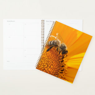 Hellgelbe Blume und Honigbiene Planer
