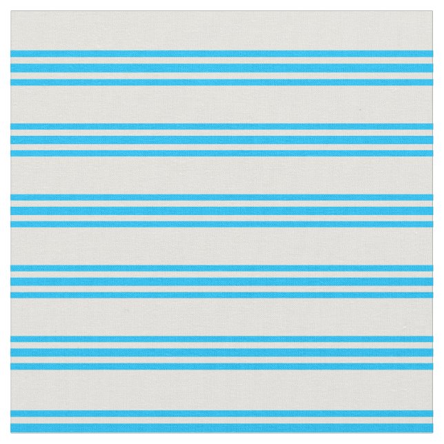 Hellgelbe und tiefblaue blaue Linien Stoff (Nahaufnahme)