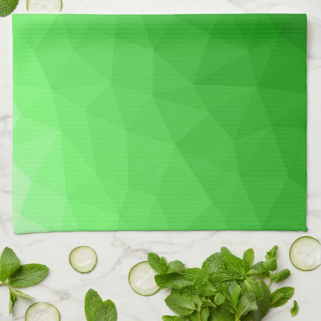 Hellgrüner geometrischer Maschenverlauf mit hellem Geschirrtuch (Gefaltet)