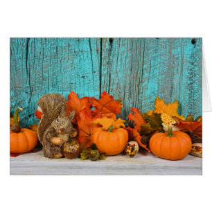 Herbstblätter und Eichhörnchen