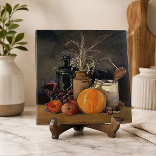 Herbstdekoration auf dem Tisch, Kürbis, Obst, Getr Fliese