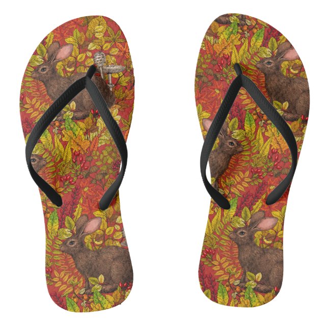 Herbstkaninchen auf rot flip flops (Fußbett)