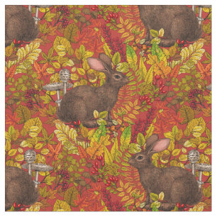 Herbstkaninchen auf rot stoff