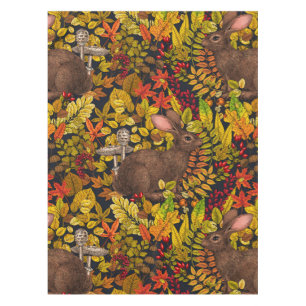 Herbstkaninchen auf schwarz tischdecke