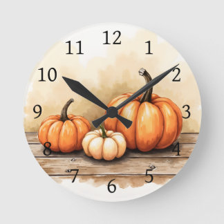 Herbstkürbisse auf Holztisch Runde Wanduhr
