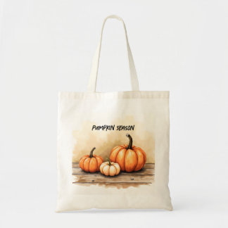 Herbstkürbisse auf Holztisch Tragetasche