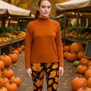 Herbstlaub auf Schwarz Leggings