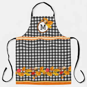 Herbstlaub auf schwarzem Gingham-Monogramm Schürze