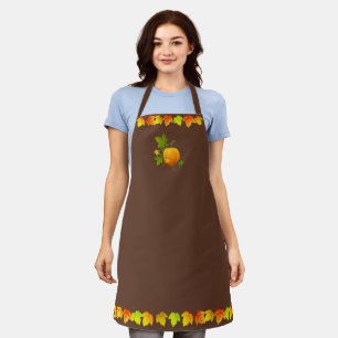 Herbstlaub und Kürbis auf Braun Schürze