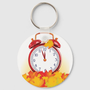 Herbstlaube für den Herbstwechsel und Retro-Uhr Schlüsselanhänger
