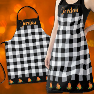 Herbstliches Schwarz-Weiß-Gingham-Muster und Kürbi Schürze