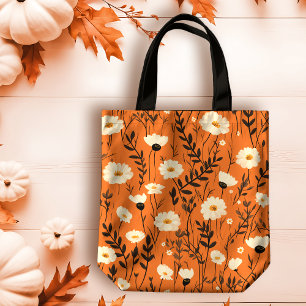 Herbstweiße Tageszeitungen auf Orange