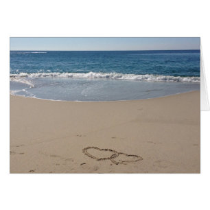 Herzen zusammen im Sand