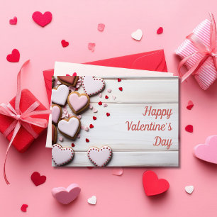 Herzförmige Kekse auf Holzboden Valentinstag Karte