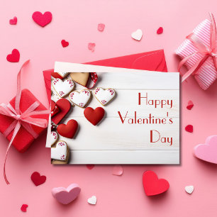 Herzförmige Kekse auf Holzboden Valentinstag Karte