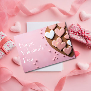 Herzförmige Kekse auf rosa Grund zum Valentinstag Karte