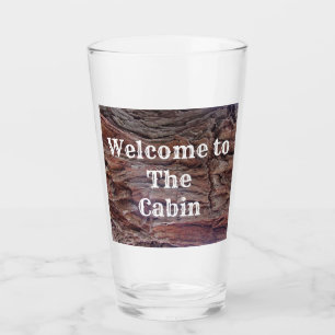 Herzlich Willkommen im Cabin Tree Trunk Foto Rusti Glas