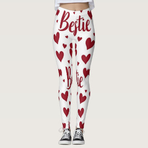 Herzmuster mit "Bestie"-Text in kursiv roter Schri Leggings