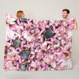 Hexagons, umgeben von rosa blütenähnlichen Formen Fleecedecke
