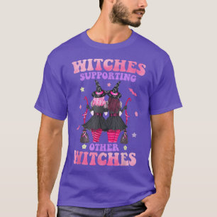 Hexen, die andere Hexen als Brustkrebszellen unter T-Shirt