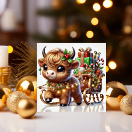 Highland Cow Pulling Santa's Sleigh Feiertagskarte