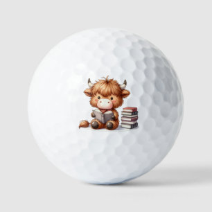 Highland-Kuh liest Bücher Golfball