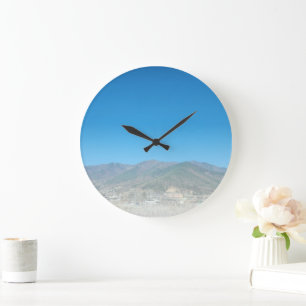 Himmel über die Berglandschaft Große Wanduhr