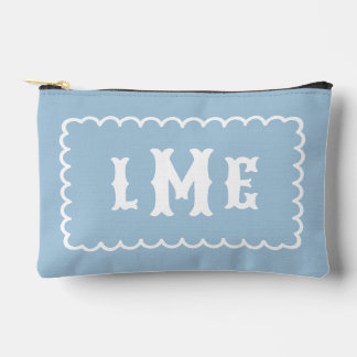 Himmelblaues und weißes monogramm mit wellenförmig zubehörtasche