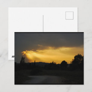 Himmlische Sonnenstrahlen in der Himmelslandschaft Postkarte