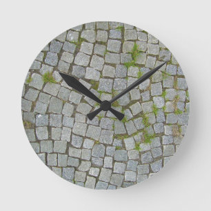 Hintergrund der Cobblestone Road Texture Runde Wanduhr