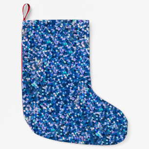 Hintergrund des blauen Glitzer Hintergrund gefüllt Kleiner Weihnachtsstrumpf