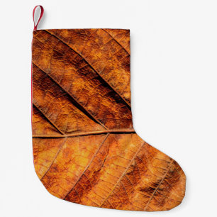 Hintergrund für trockene Blätter Kleiner Weihnachtsstrumpf