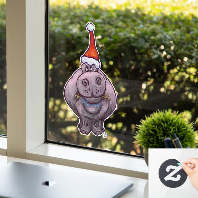 Hippo in einer Weihnachtsmannmütze Weihnachtsfenst Fensteraufkleber (Büro)