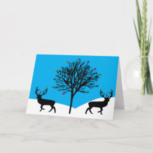Hirsche auf der Weihnachtsgrußkarte Feiertagskarte