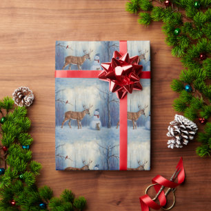 Hirsche und Happy Snowman Winterurlaubslandschaft Geschenkpapier