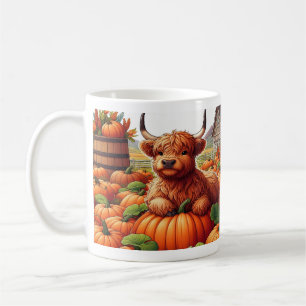 Hochland-Kuhkälber ruhen zwischen Kürbissen Kaffeetasse