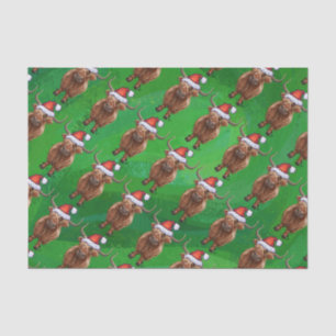 Hochlandkuh in Weihnachtsmannmütze-Muster auf Grün Seidenpapier
