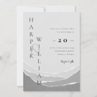 Hochzeit in grauen zerrissenen Papierbergen