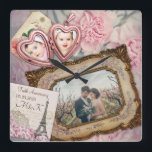 Hochzeit Jubiläum Rosa Herzklettern Ihre Fotos Quadratische Wanduhr<br><div class="desc">Erschaffen Sie Ihre eigene Gedenkkollektion mit diesem schönen Design mit einem antiken rosa, herzförmigen Schließfach für Ihre individuellen Fotos und einem wunderschönen barocken Bilderrahmen für Ihr größeres Foto. Eine Pariser Postkarte enthält Ihren individuelle Name, Ihre Veranstaltung oder einen anderen Text. Schöne rosafarbene Nelkensorte Blume im Hintergrund. Ersetzen Sie die Foto...</div>