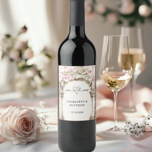 Hochzeit mehr Herz Drehbuch rosa Floralbogen Bogen Weinetikett