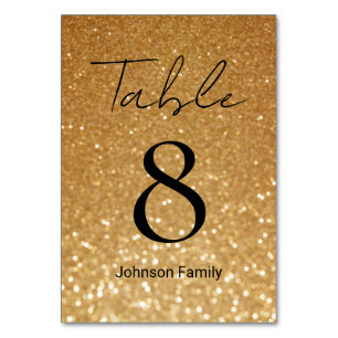 Hochzeit mit elegantem goldfarbenem Glitzer Tischnummer