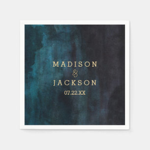 Hochzeitsfeier mit blauem Wasser und Gold-Monogram Serviette