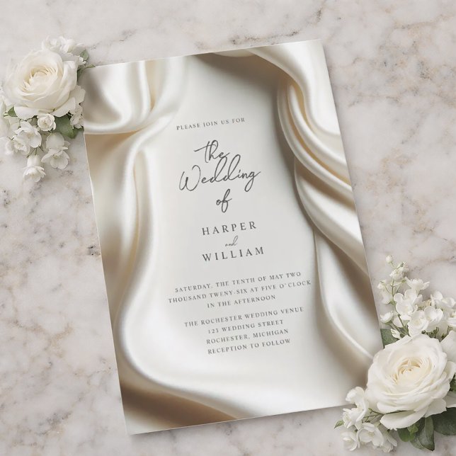 Hochzeitsfeier mit weißem Satin Einladung (Elegant wedding invitation featuring a white satin frame.)