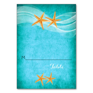 Hochzeitsfeiern am Strand und Platzkarte Tischnummer