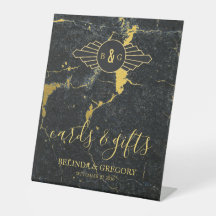 Hochzeitskarten und Geschenke aus schwarzem Gold