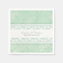Hochzeitsweiße Spitzen auf grünem Pfefferminzpapie Serviette