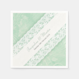 Hochzeitsweiße Spitzen auf grünem Pfefferminzpapie Serviette