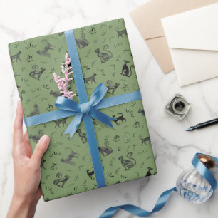 Höhlenkunstkatzen auf Grün Geschenkpapier