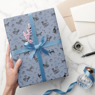 Höhlenkunstkatzen auf Hellgrau-Blau Geschenkpapier